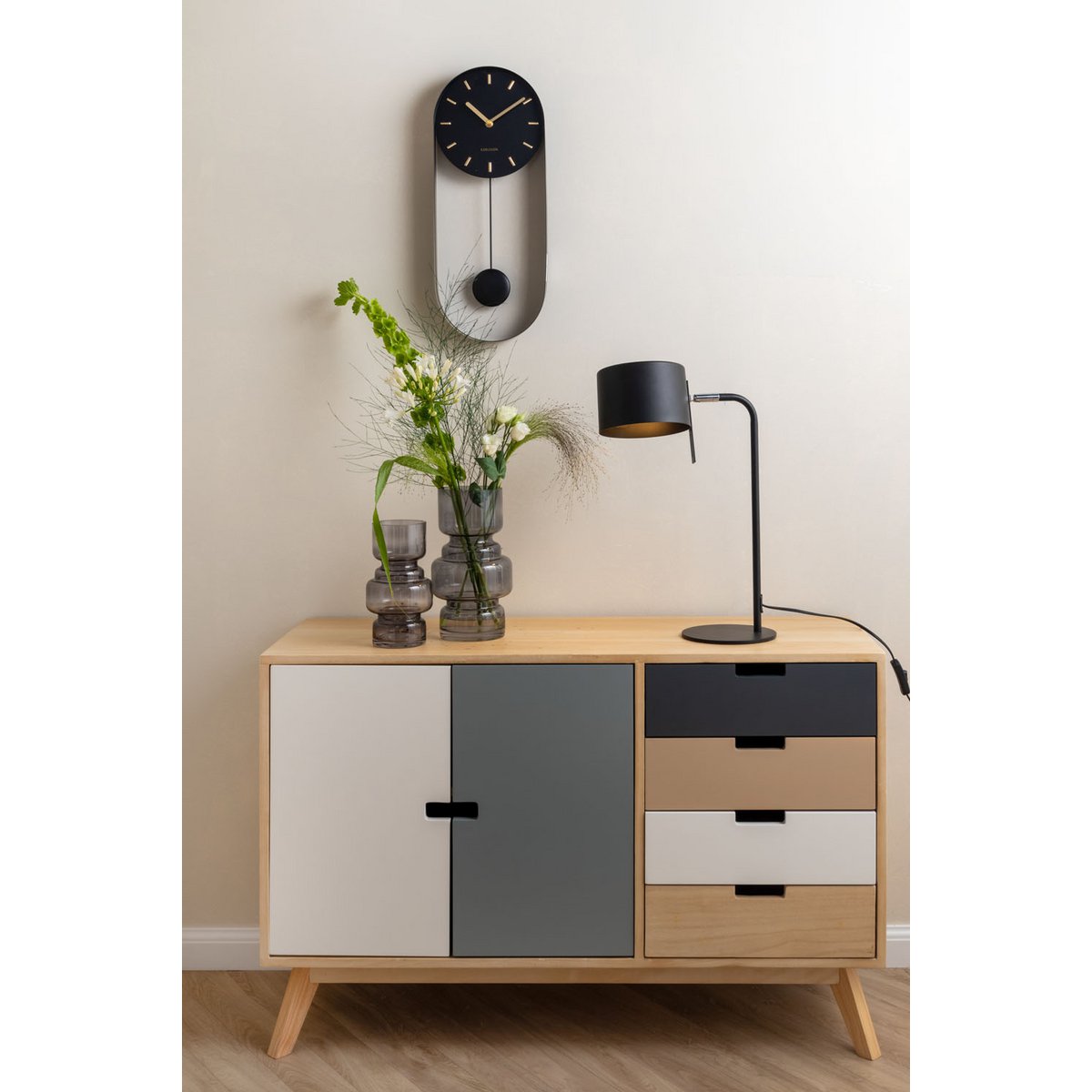 Wandklok slinger charme
