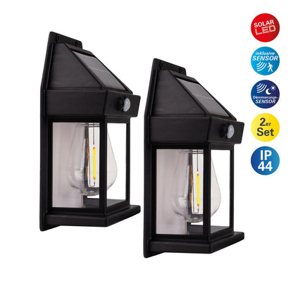 2 Set Solar Wall Lamp "Mira" ca. 17 cm hoog, gemaakt van zwart weerbestendig plastic, geïntegreerde LED in warm wit, inclusief bewegingsdetector en schemeringsensor