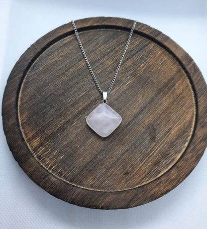 Silver-colored necklace with rose quartz pendant