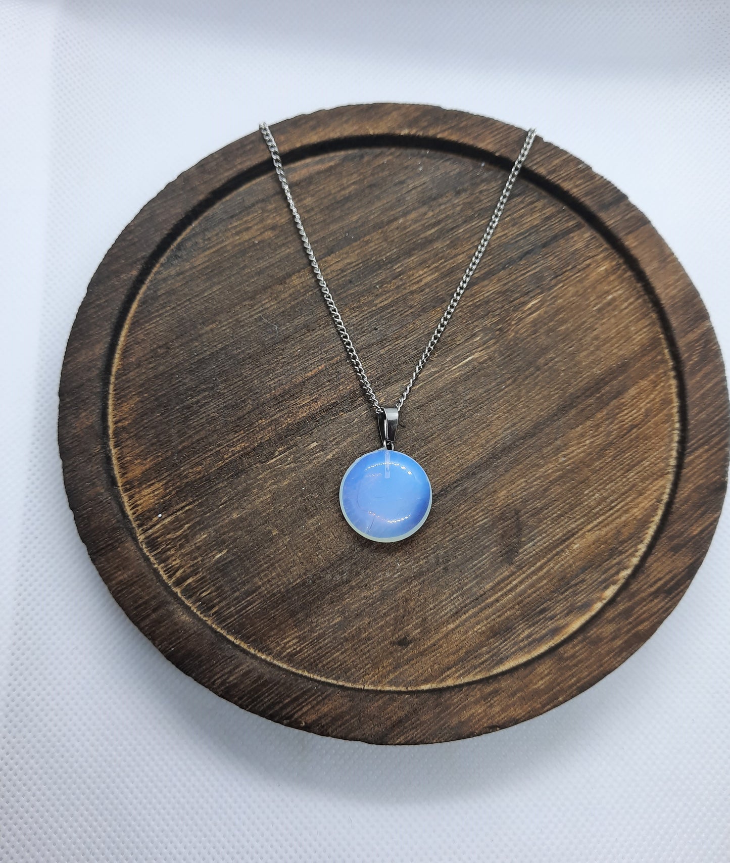 Silver-colored necklace with opalite pendant