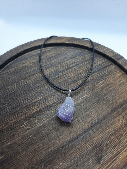 Black leather necklace with amethyst pendant